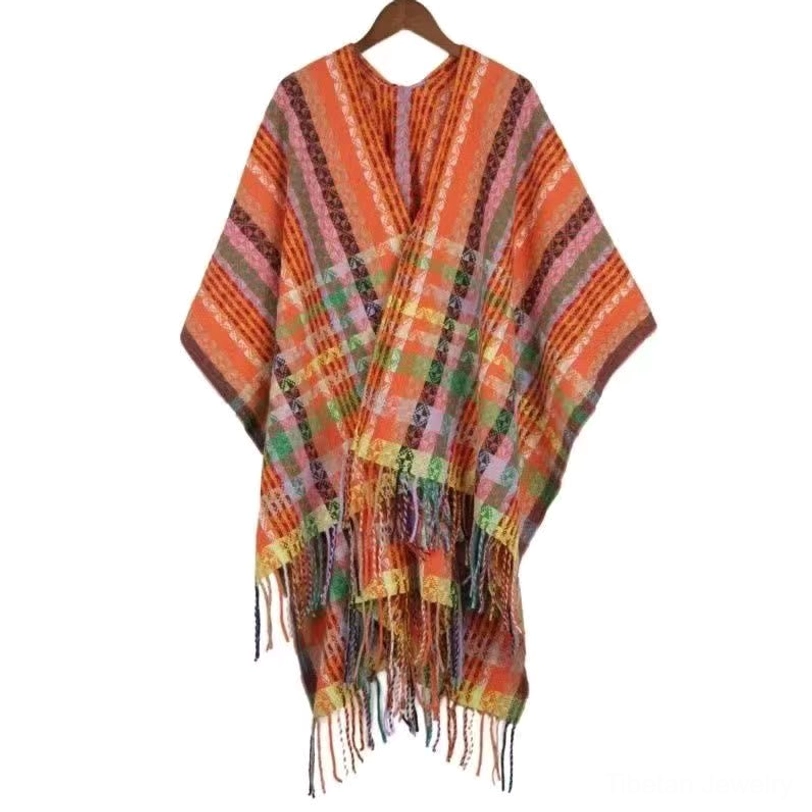Tibetan striped wrap shawl in dark orange tone displaying geometric weave and decorative fringed hem