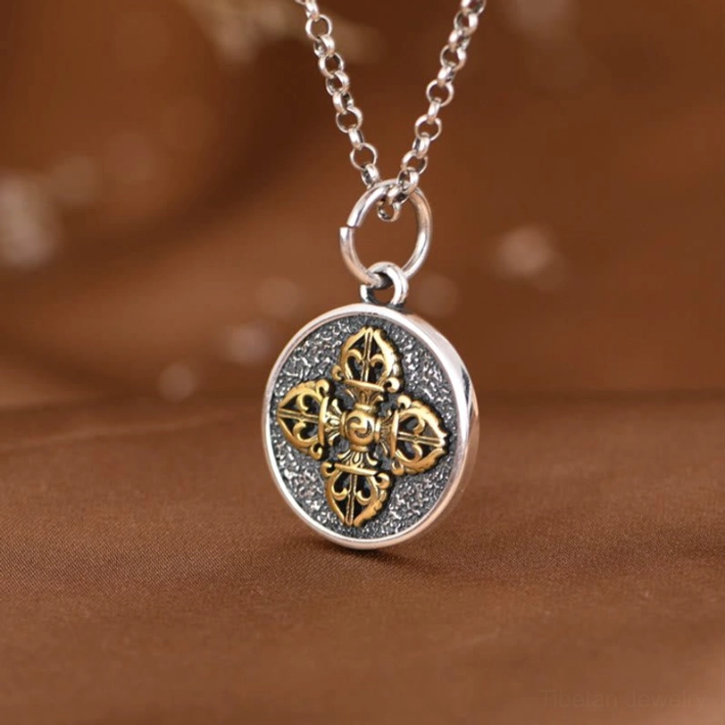 Dorje vajra necklace pendant front angled view showing chain bail and circular frame