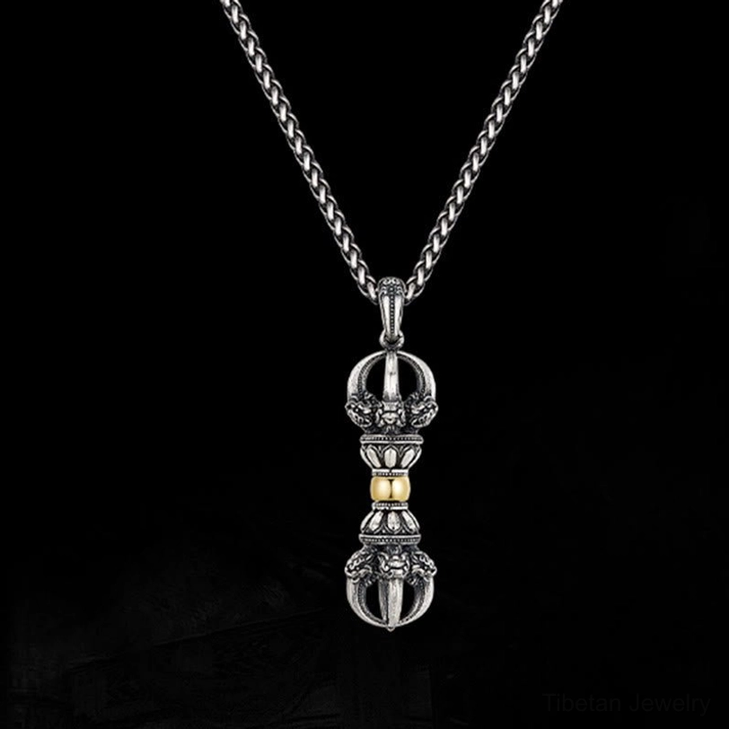 Front facing Tibetan Dorje Vajra necklace with wheat-link chain on black background, showcasing complete two-tone pendant design