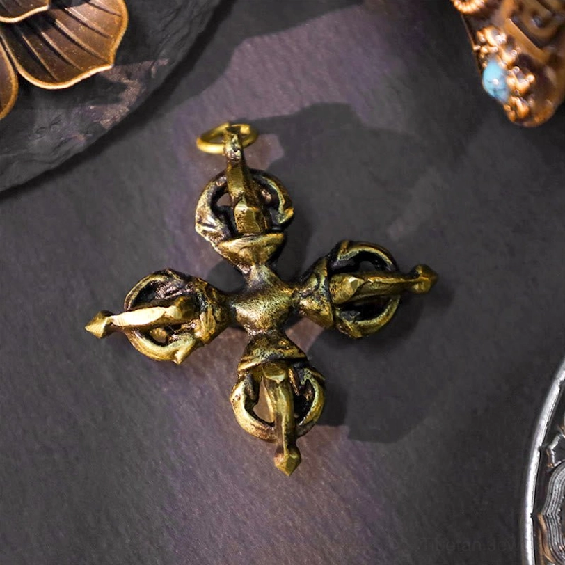 Full cross double dorje vajra pendant with symmetrical intricate ritual carvings - aged gold-brass tone handcrafted Tibetan enlightenment symbol