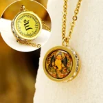 Double-sided Tibetan Buddhist pendant necklace with Yellow God of Wealth front design and sacred mantra back - titanium steel with crystal accents