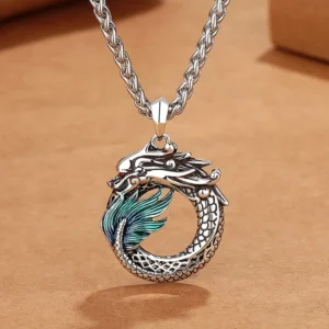 Tibetan dragon copper necklace with silver wheat chain and teal enamel accent - top view close-up detail