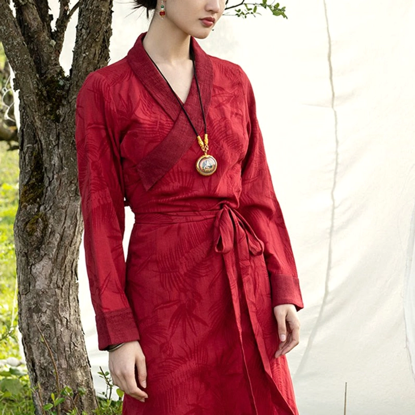 Tibetan maxi dress worn model shot from side angle highlighting graceful drape, long sleeves, and flowing hemline of chuba style