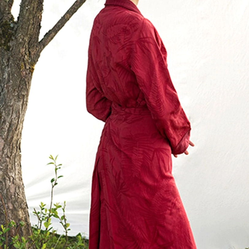 Tibetan wrap dress detail showing waist tie technique and how to style the self-adjustable sash for custom fit