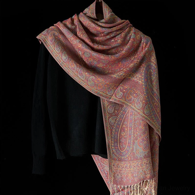 Full-length side view of Tibetan dusty rose paisley printed shawl, demonstrating full coverage and drape