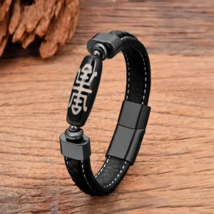 Beige Tibetan Dzi Bead leather bracelet featuring hand-painted protective amulet bead with stainless steel magnetic closure, right-angle product shot