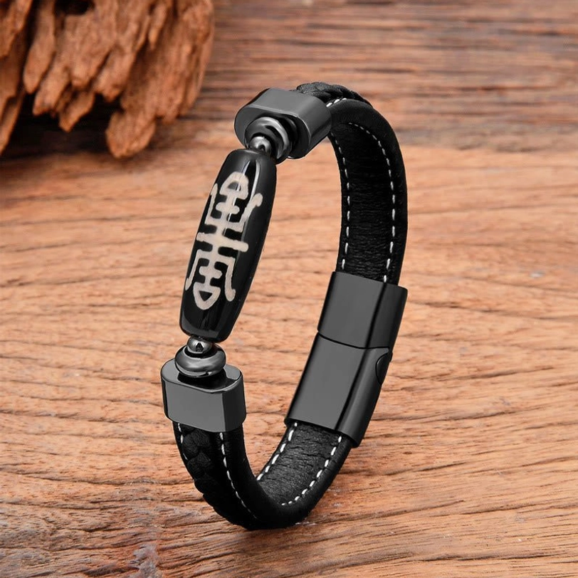 Beige Tibetan Dzi Bead leather bracelet featuring hand-painted protective amulet bead with stainless steel magnetic closure, right-angle product shot