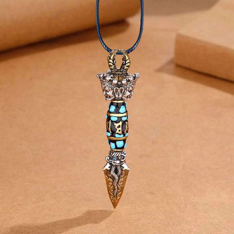 Tibetan Dzi Bead Rotatable Pendant Necklace with leather rope strap option, showing vintage Tibetan religious ornament and protective amulet design