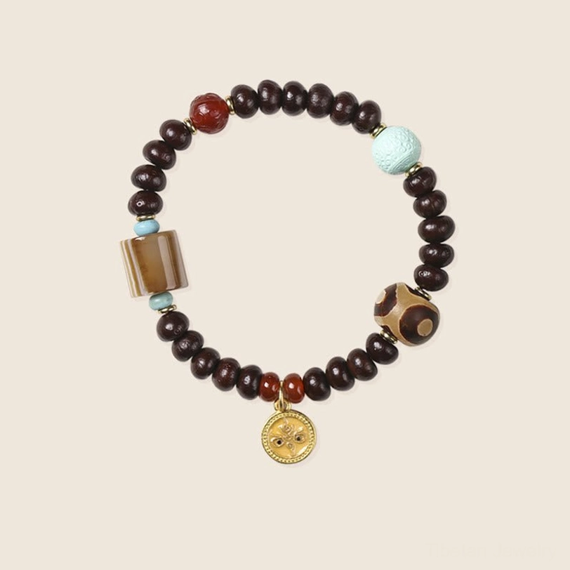 Tibetan Dzi bead and bodhi seed bracelet for meditation practice, spiritual awakening, and wealth attraction - natural gemstone jewelry