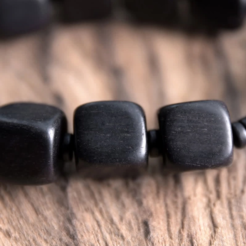 Tibetan ebony wood nine-eye dzi bead bracelet unisex sizing fit guide for men and women spiritual protection amulet