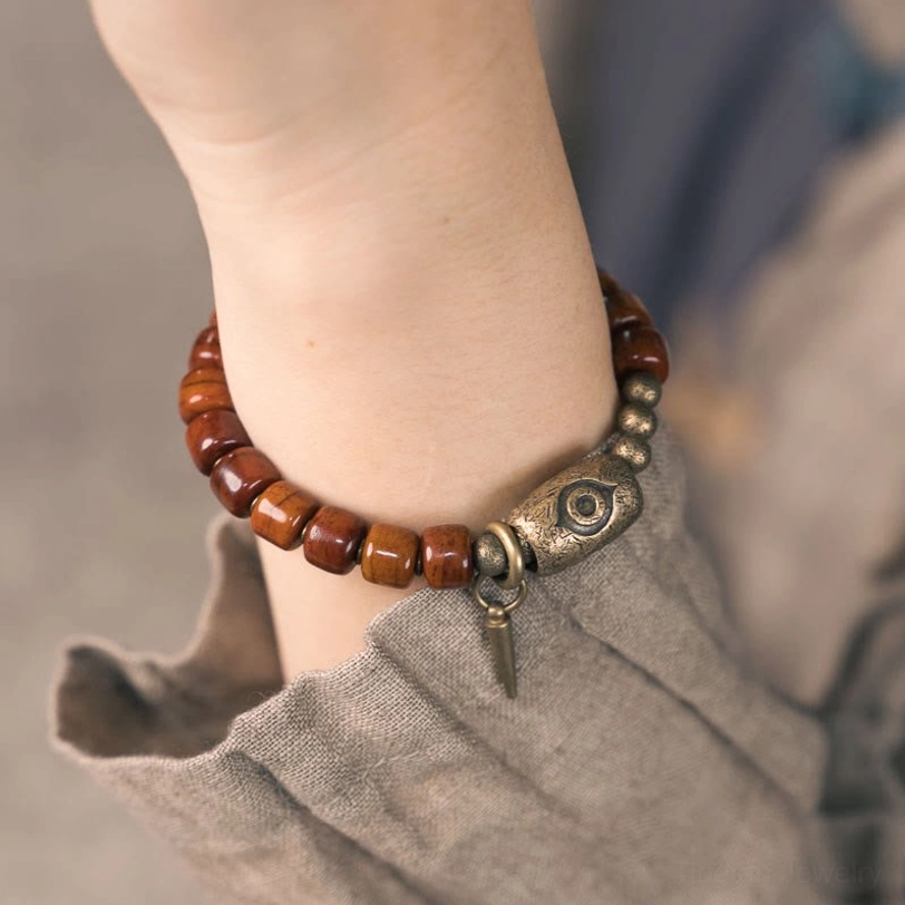 Tibetan bone Dzi bracelet spiritual protection amulet with copper eye motif and authentic Himalayan craftsmanship