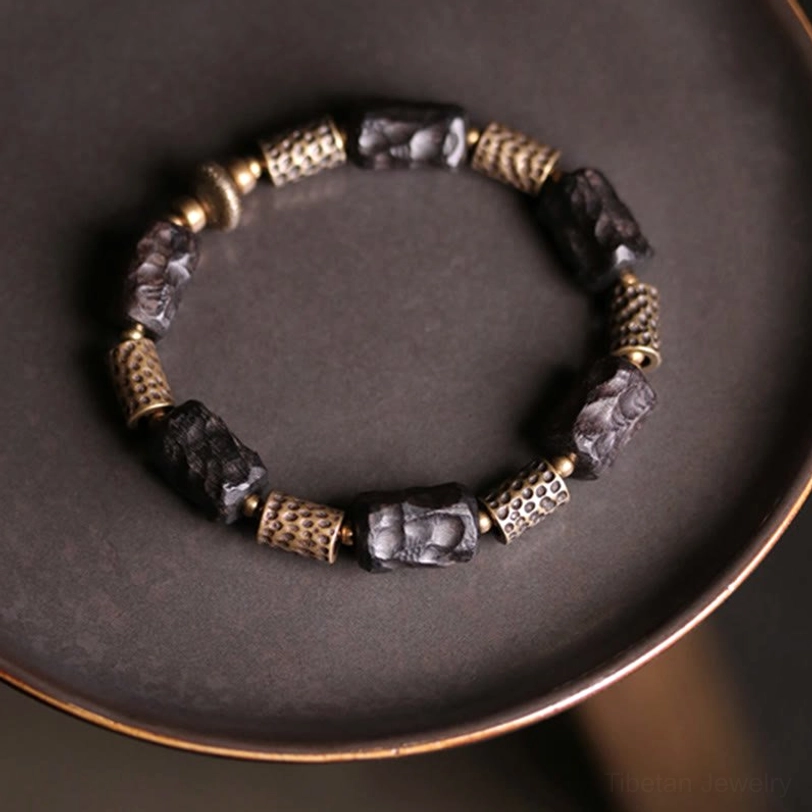 Tibetan spiritual ebony wood copper bracelet gift packaging presentation for meaningful present to meditation and wellness practitioner