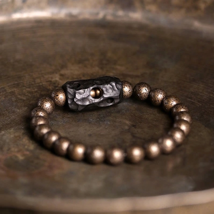 Tibetan protection bracelet full circle flat lay showing complete beaded design on vintage surface
