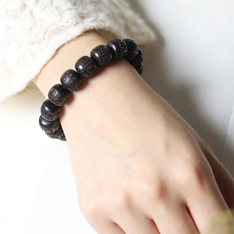 Tibetan ebony wood Om Mani Padme Hum bracelet spiritual protection and meditation tool