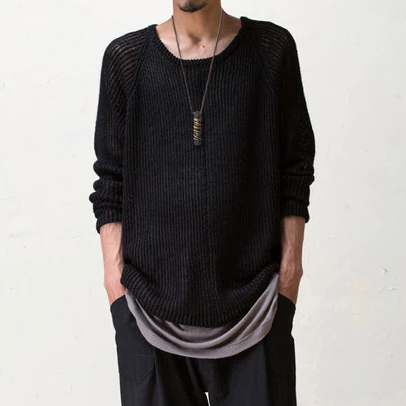 Ebony wood Tibetan zen necklace worn on model, chest-level pendant on dark knit sweater, lifestyle photo showing pendant size and wearability