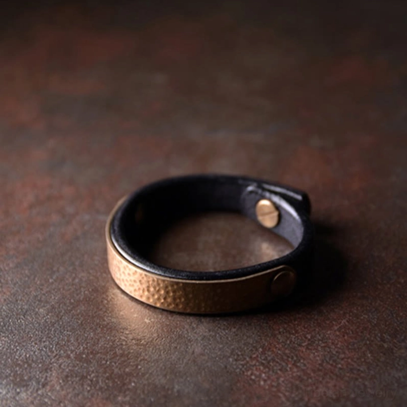 Tibetan leather metal wealth bracelet showcasing natural material variations and eco-friendly artisan production methods