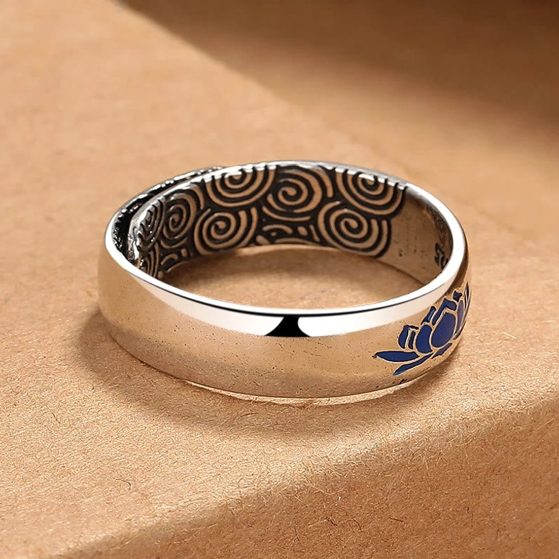 Adjustable enlightenment ring right profile showing cloud scroll engravings and lotus design on copper band