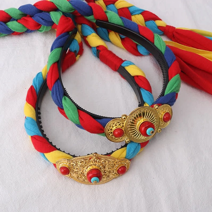 Tibetan ethnic hair decoration with mixed color braids, dual gold decorative emblems and extra fabric tassels