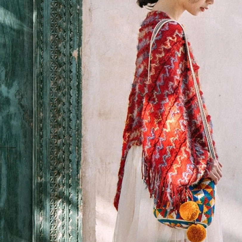 Tibetan ethnic poncho shawl with decorative tassel hem and bohemian striped design