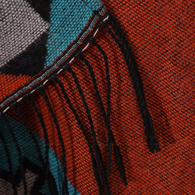 Tibetan ethnic wrap shawl modeled as evening wear or formal styling option with geometric collar and tassel details