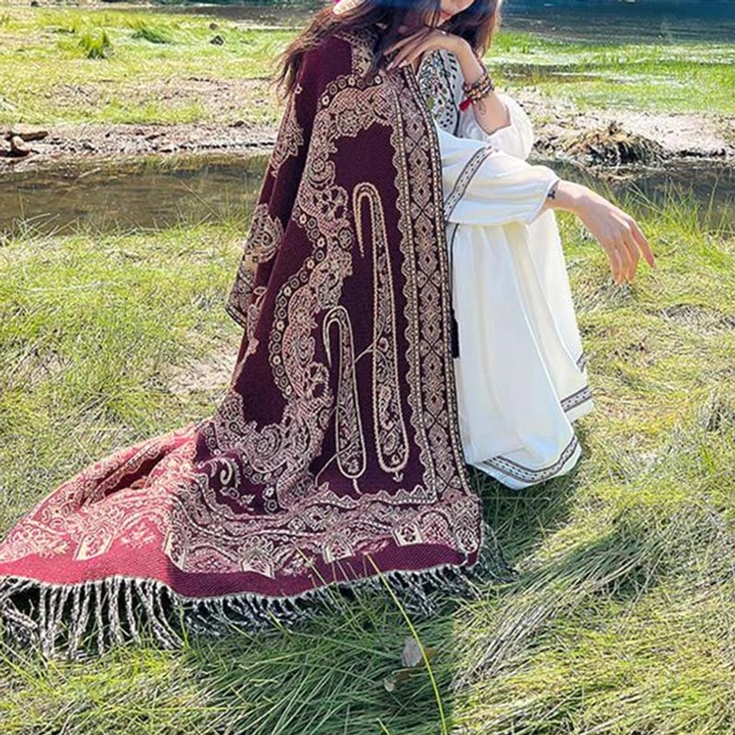 Tibetan botanical shawl detail shot emphasizing handwoven traditional craftsmanship