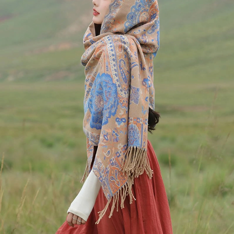 Tibetan ethnic shawl in neutral color, demonstrating versatile styling with contemporary fashion pieces