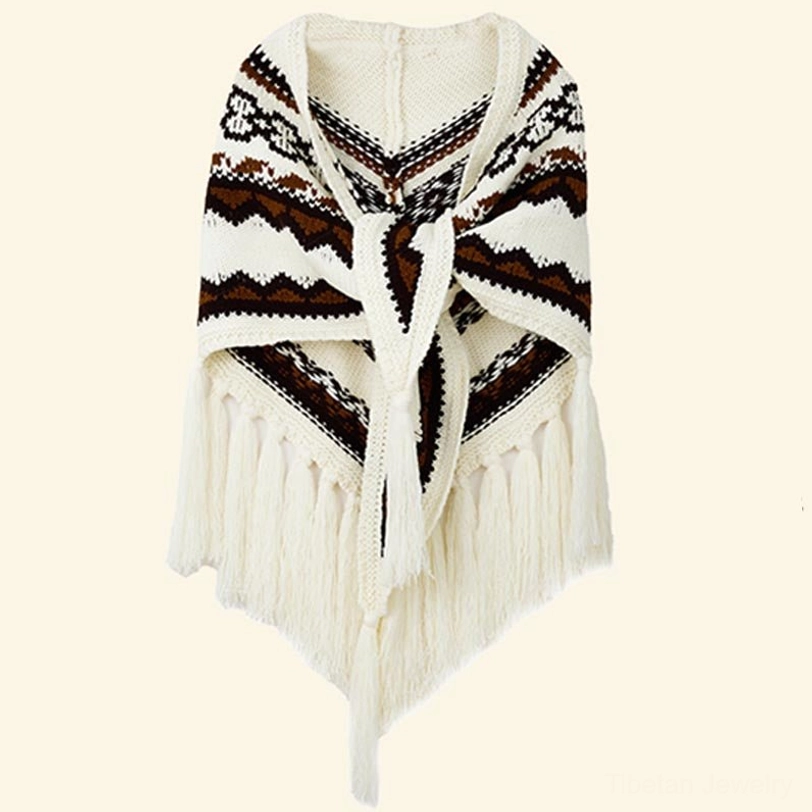 Woman wearing Tibetan ethnic stripe triangular shawl in earthy natural tones outdoors