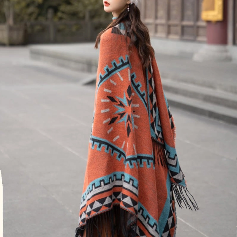 Front styling of Tibetan ethnic wrap shawl layered over casual wear showing versatile everyday fashion application