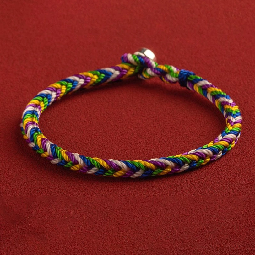 Sacred geometry five-element Tibetan bracelet showing Buddhist knot design and color harmony