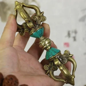 Tibetan five-prong vajra dorje handcrafted copper held in hand with turquoise inlay details