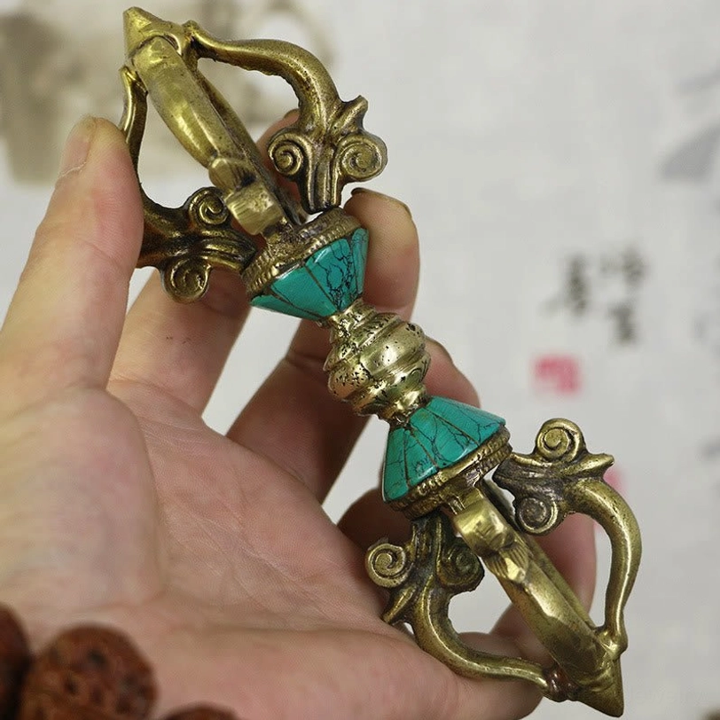 Tibetan five-prong vajra dorje handcrafted copper held in hand with turquoise inlay details