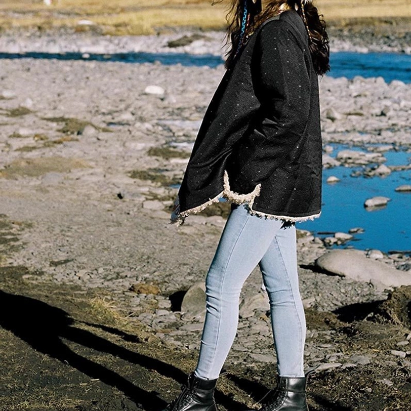 Tibetan fleece-lined winter top detail shot highlighting artisan handcraft and traditional ethnic design elements