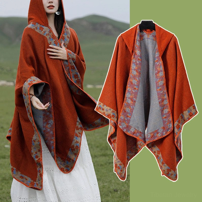 Tibetan floral border wrap shawl worn indoors showing color vibrancy and reversible design feature