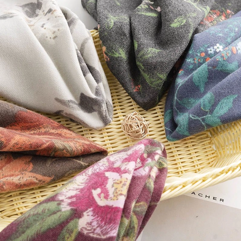 Tibetan cultural floral wrap scarf styled with fashion accessories showing versatile styling options for different occasions