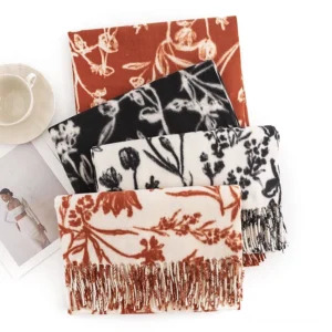 Multiple Tibetan floral shawls flat lay showing various color options including black, cream, rust, and beige with vintage flower prints
