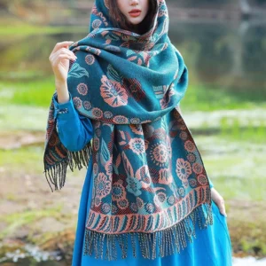 Hooded Tibetan floral shawl with intricate leaf pattern design outdoors