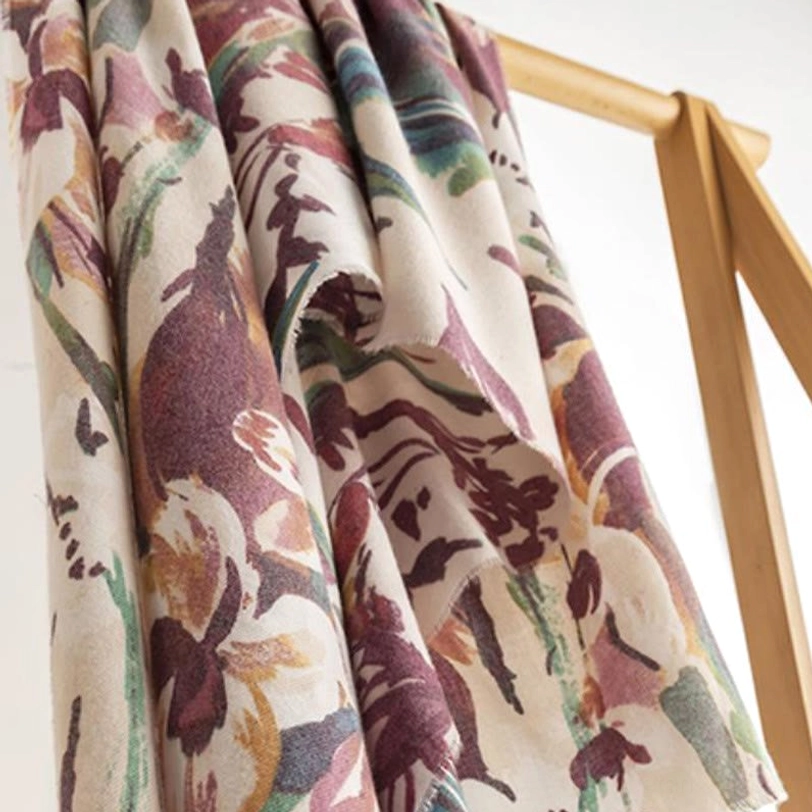Tibetan watercolor floral shawl draped elegantly showing soft fabric movement and color harmony