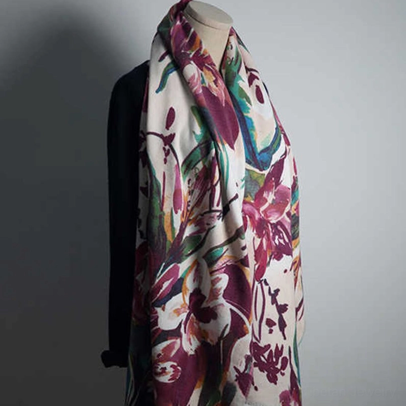 Front view of mannequin wearing Tibetan watercolor floral shawl with coordinated styling and unified print design