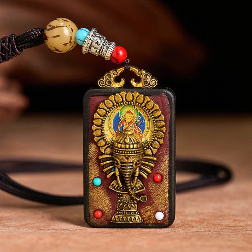 Tibetan Ganesha prosperity necklace with carved ebony wood and turquoise stone inlay