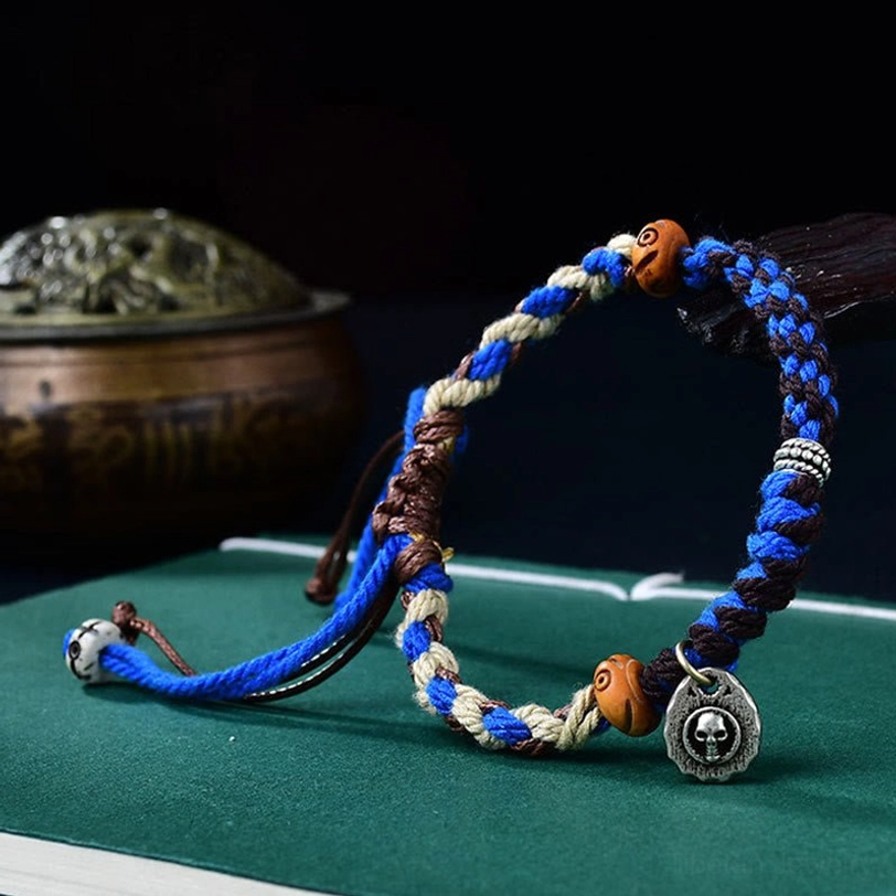 Tibetan Garuda protection bracelet collection showing multiple color variations and adjustable wrist sizing
