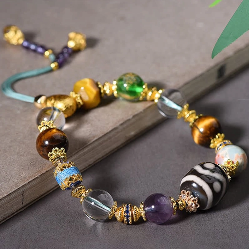 Gemstone bracelet featuring amethyst tiger eye and metal accents collection view