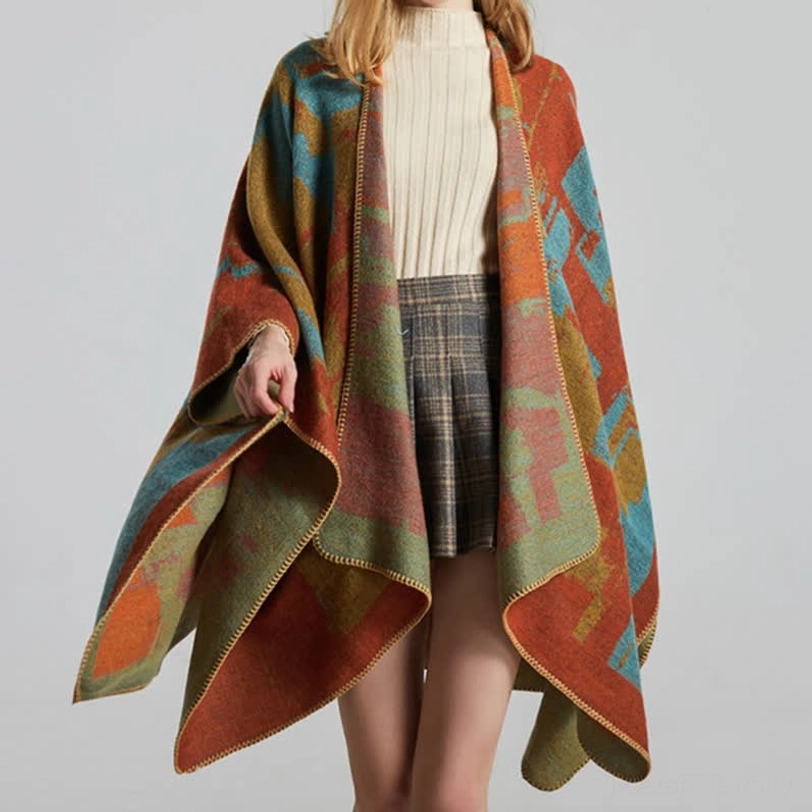Tibetan orange wool cape shawl folded display showing full geometric pattern design