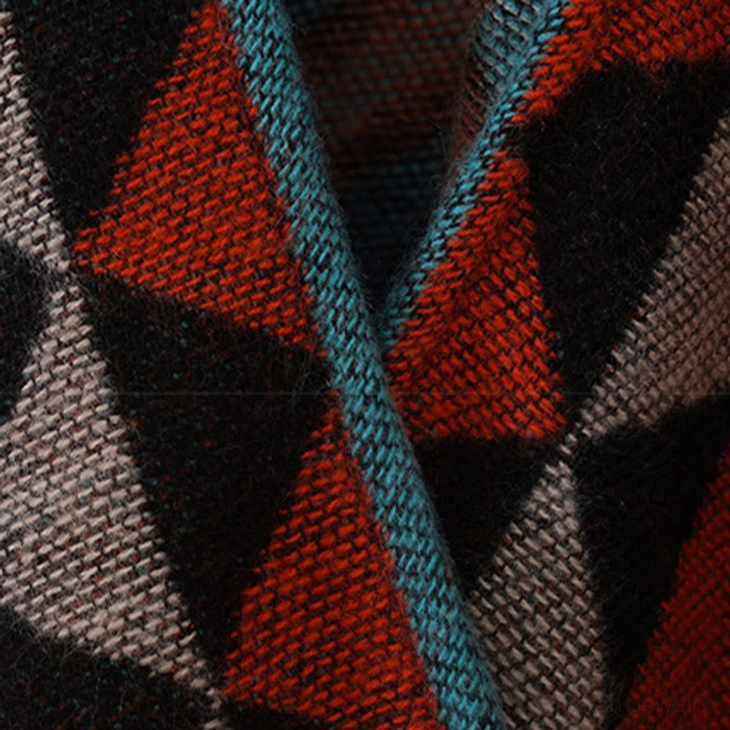 Tibetan geometric tassel shawl styled as cozy throw blanket for indoor relaxation and bohemian home décor