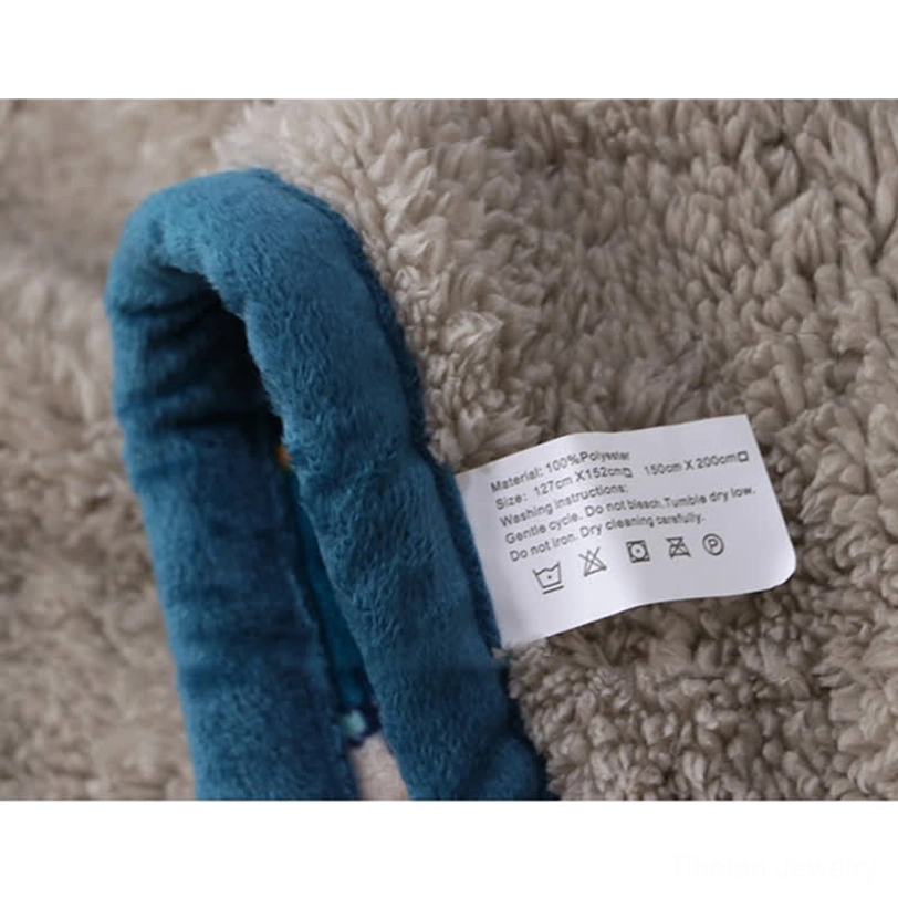 Tibetan geometric throw blanket full product view showcasing bohemian tribal design, perfect for meditation and wellness spaces