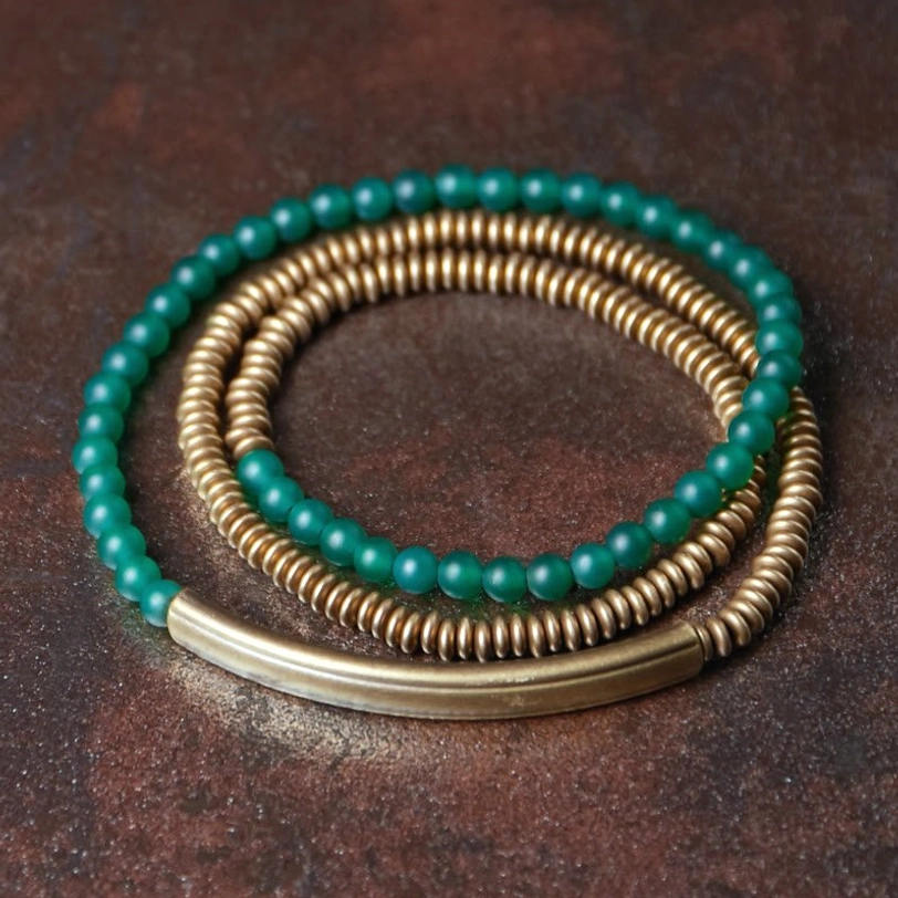 Green agate Tibetan prosperity bracelet with brass accents showing vibrant stone color and authentic handmade craftsmanship