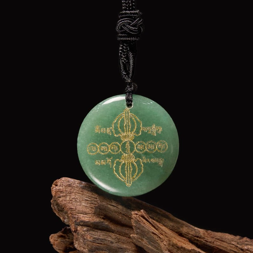 Green aventurine Vajra Dorje Tibetan necklace pendant with golden Sanskrit patterns and black braided cord