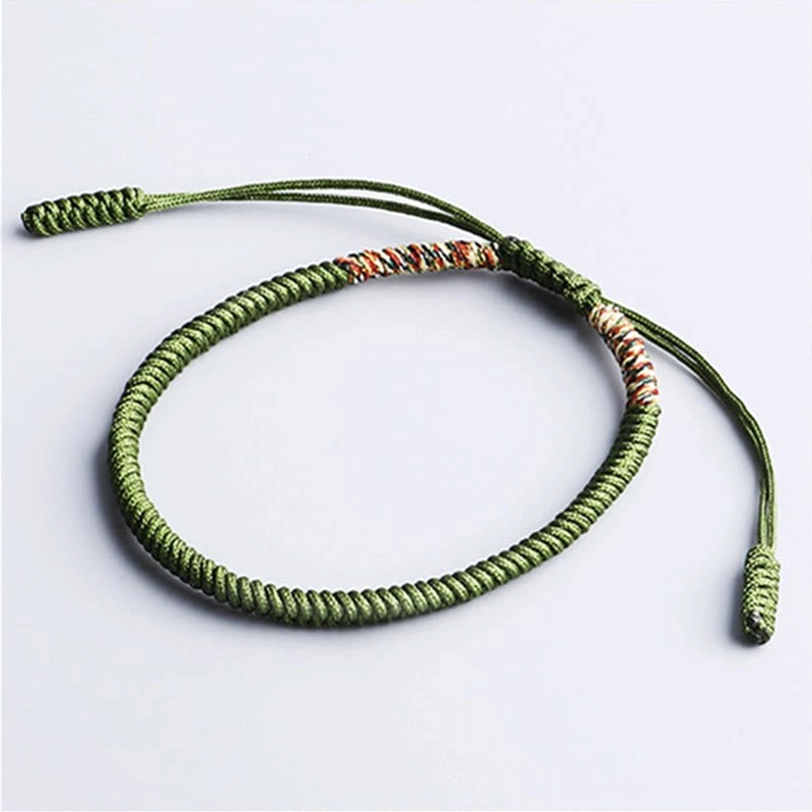 Solid green Tibetan handwoven bracelet with protective knot and adjustable sliding ties
