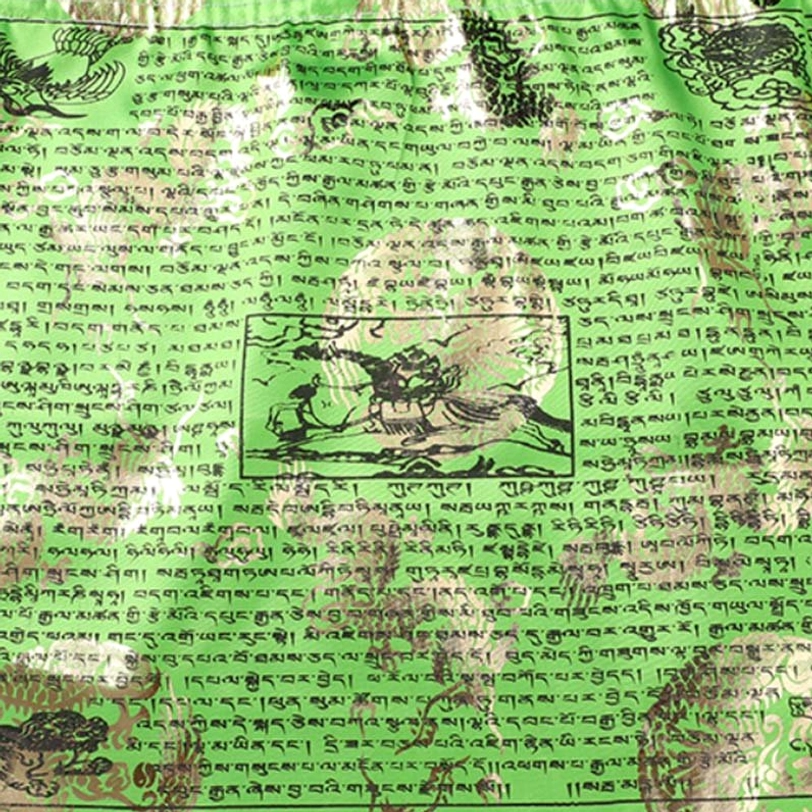 Green Tibetan prayer flag - gold foil warrior and dragon designs with traditional Tibetan text