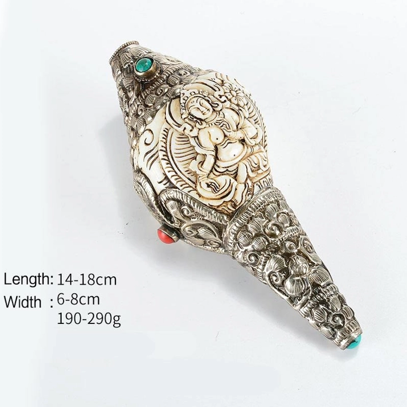 Tibetan Green Tara hand-engraved conch shell featuring compassionate deity relief with turquoise and coral inlay