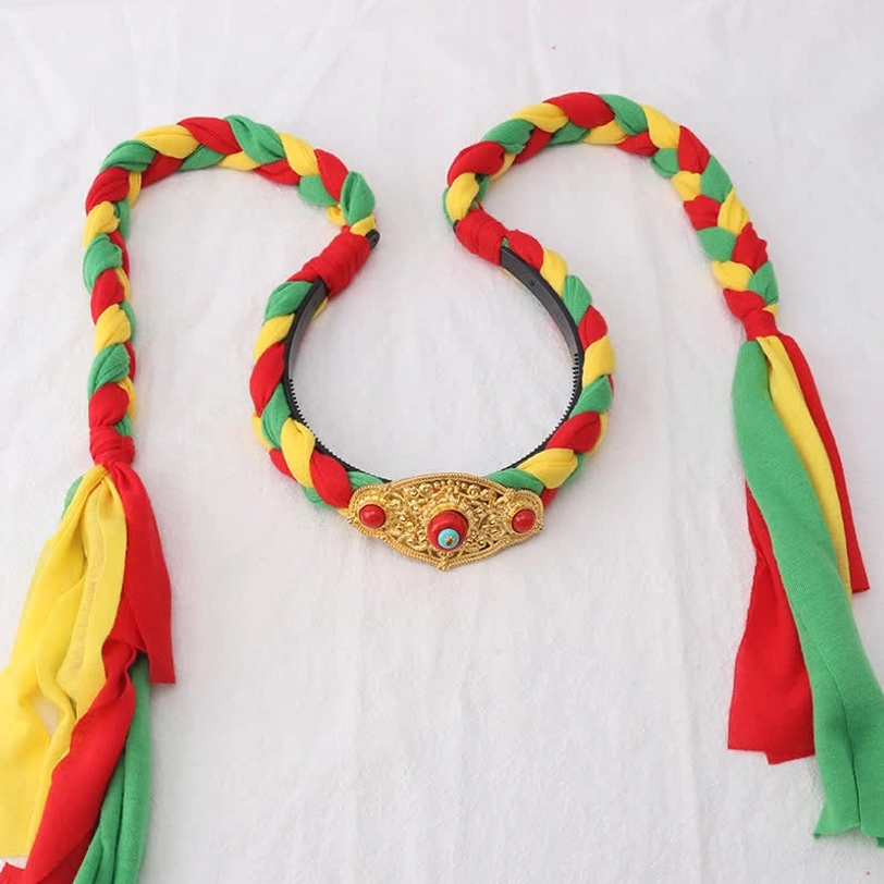 Handmade Tibetan hair clip with multicolor round bead patterns and authentic fabric tassels